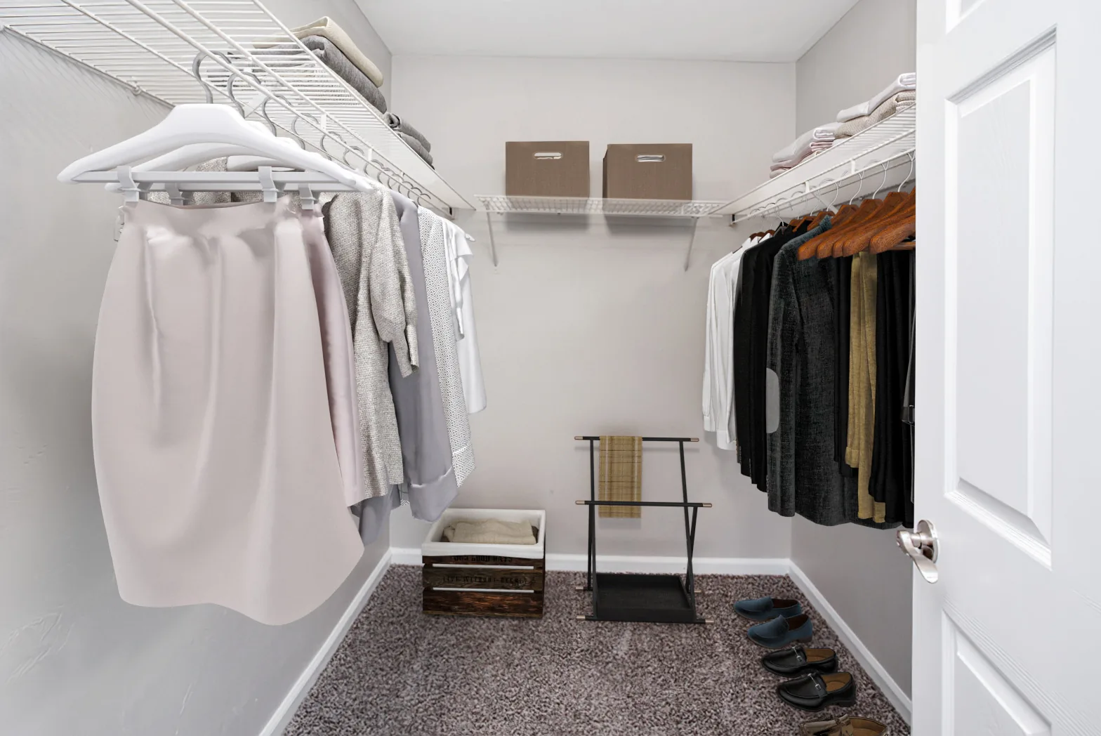 Walk-in closet with shelving in a Crescent Ridge apartment
